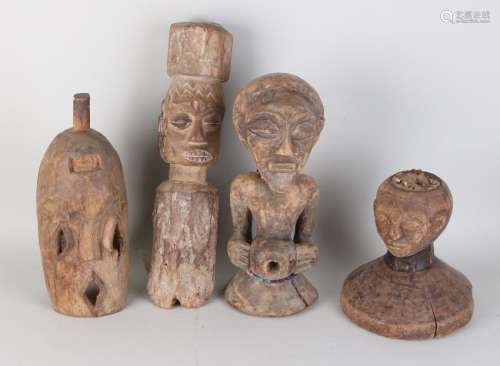 Four times old African wood carvings. Consisting of: