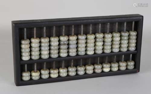 Old Chinese abacus with jade counters. 20th century.