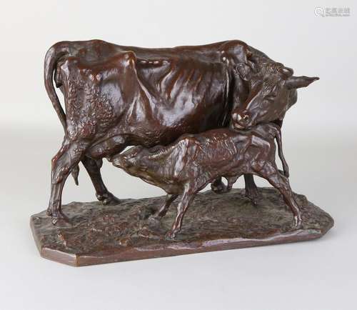 Large antique bronze cow with calf. By Pierre Jules