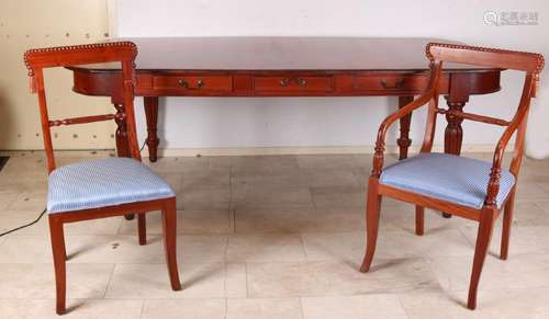 Very large English mahogany table with eight chairs. Of