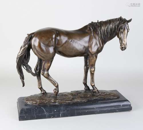 Large bronze horse. On black marble basement. Signed GJ