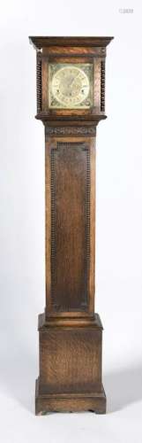 Small antique oak English standing clock with quarter