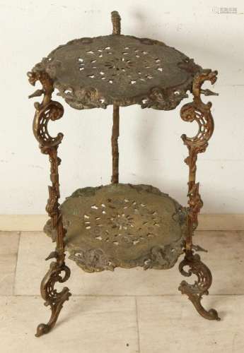 Old openwork brass floor flower table with dragons and