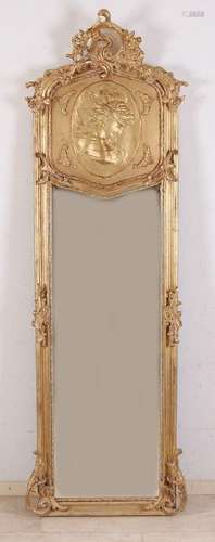 Gold-colored mirror after an antique example, with