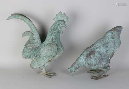 Large old bronze rooster and chicken with green patina.