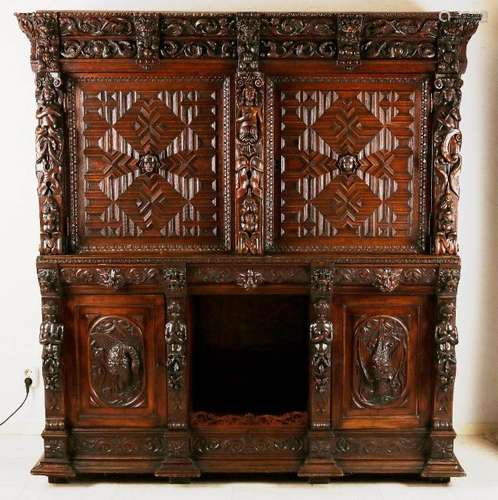 Antique oak sculpted cupboard with figures, garlands,