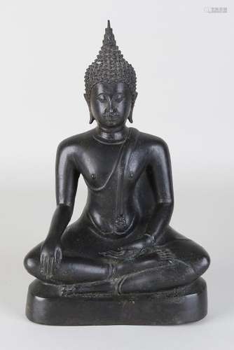 Old / antique Chinese bronze buddha in lotus position.