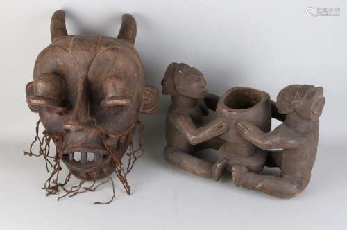 Two times old African carvings. Once large African mask