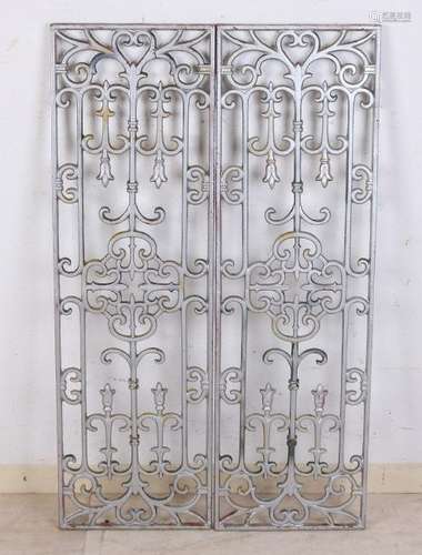 Two antique cast-iron door grids. Size: 90 x 28 x 1.5