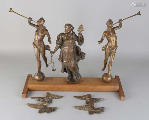 Three large bronze figures for an Amsterdam standing