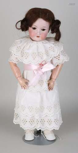 Antique German porcelain doll with articulated body and