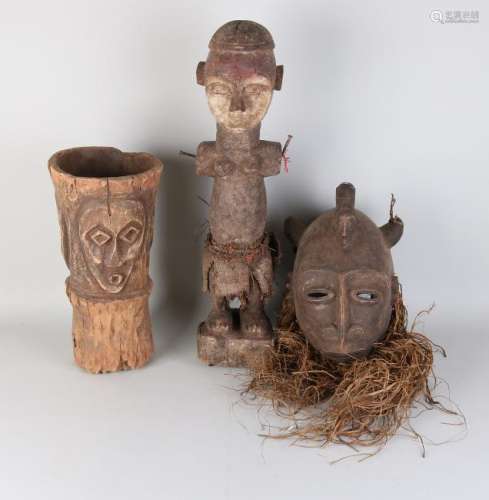 Three times old African wood carving. One large