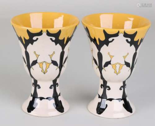 Two antique polychrome Ram Arnhem Colenbrander vases.