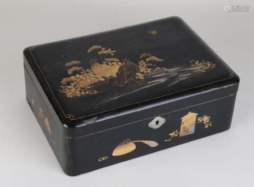 Large old Japanese lacquer box with gold decor and
