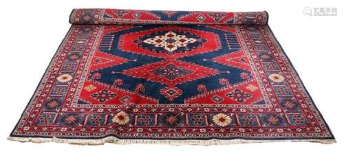 Large hand-knotted carpet made of wool. With a Persian