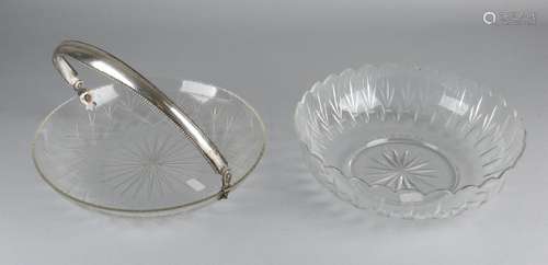 Two crystal bowls, one with scalloped edge and star on