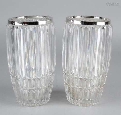 Two crystal vases with vertical cut with silver smooth