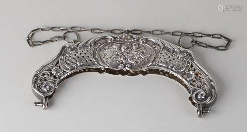 Silver bag bracket, antique. a rounded bracket with