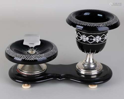 Smoke set made of black glass with white machining,