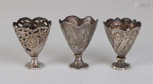 Three silver cups,> 800/000, one openwork holder with