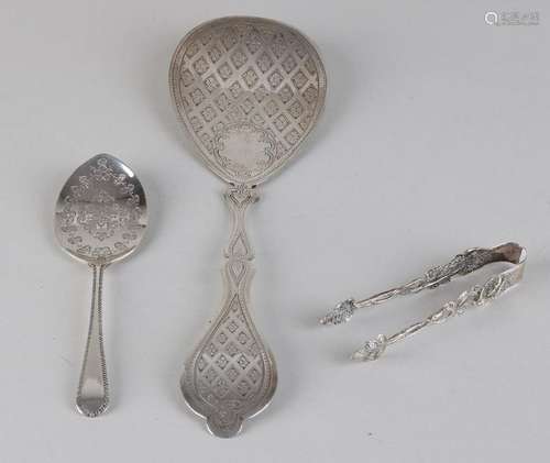 Three parts of silver, a small lump of tongs, 835/000,