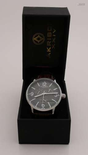 Akribos men's watch with steel case and leather strap.