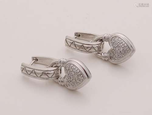 Silver earrings with heart pendants, 925/000, set with