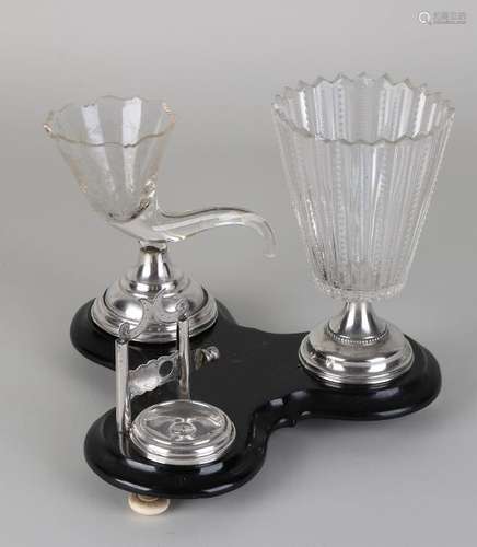 Table-top with cut crystal cigars and cigarette vase