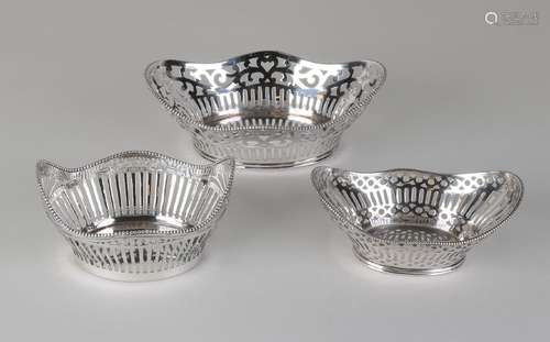 Three silver bonbon baskets, 833/000, with wavy edge