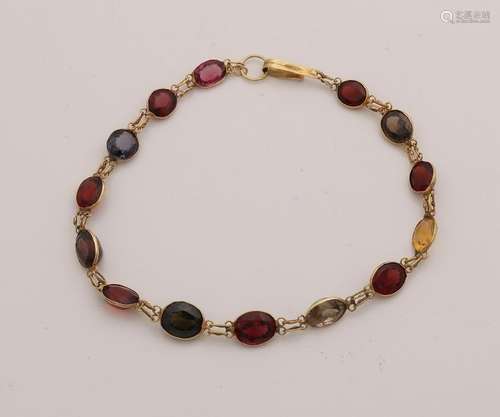 Bracelet with various oval faceted stones set in a