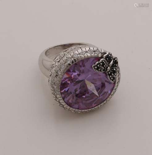 Silver ring with round faceted purple stone decorated