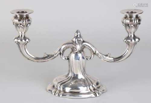 Silver candlestick, 835/000, on a contoured oval foot