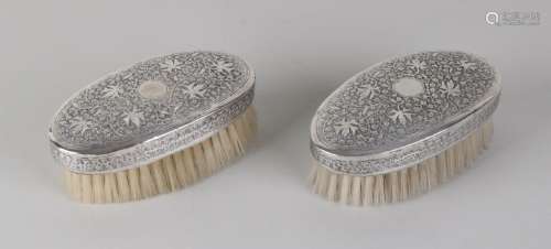 Set oval clothes brushes. Equipped with silver hood