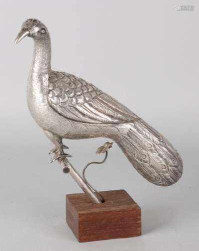 Silver spreader, BWG, in the shape of a peacock on a