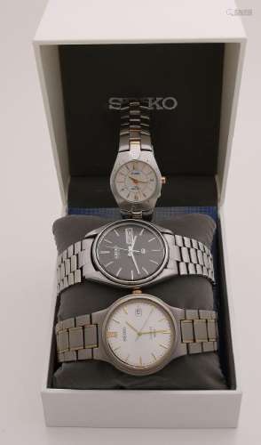 Two seiko men's watches, a round titanium model with