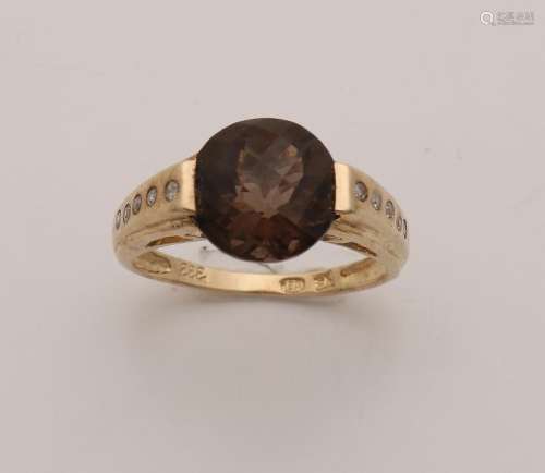Ring, 333/000, with a round faceted smoky quartz, with