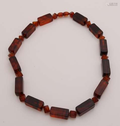 A necklace with rectangular and cubic beads. 22x8x8mm