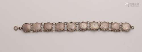 Silver bracelet with 10 dimes from before 1942, clamped