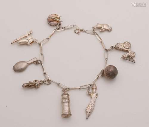 Silver close for ever bracelet with 9 charms. about 18