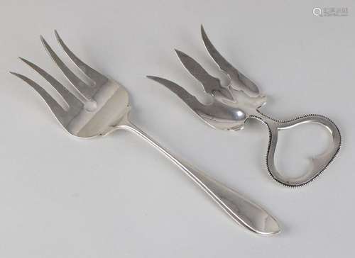 Two silver serving forks, 835/000, a large fork with 4