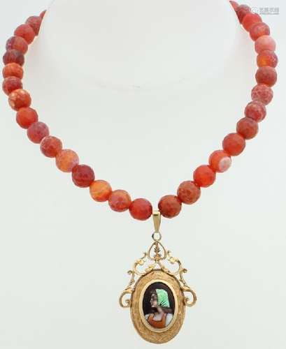 Necklace of agate beads with a gold limoges pendant,