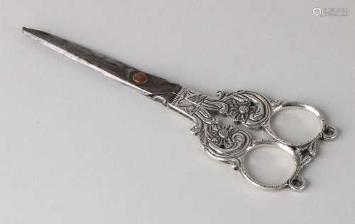 Antique scissors with silver handles, made from