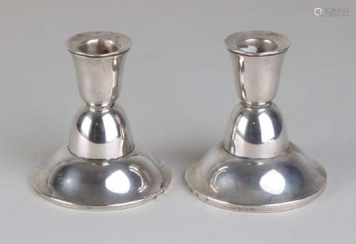 Two silver candlesticks, 835/000, low smooth model on