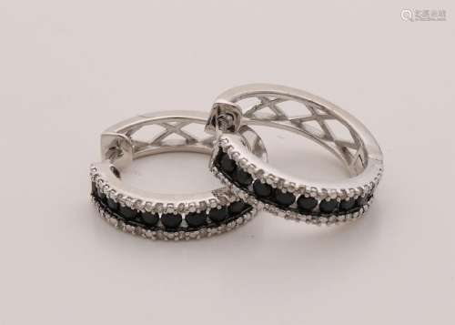 Silver earrings, 925/000, with sapphires and diamonds.