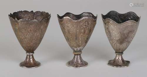 Three silver cups,> 800/000, one decorated with