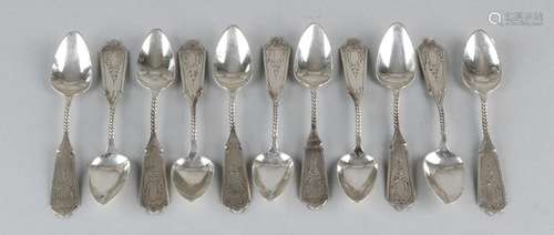 Eleven silver teaspoons, 835/000, with puntbak, a