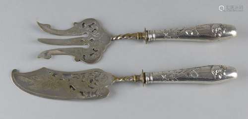 Two pieces of fish preserves with silver handles,