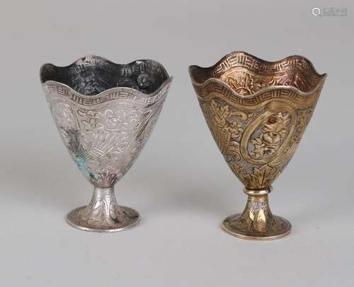 Two silver cups,> 800/000, one holder engraved with