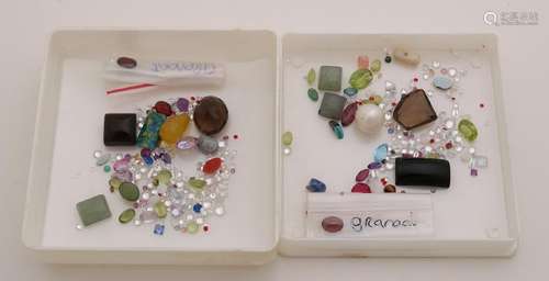 Lot with 2x 50 ct gemstones with grenade,