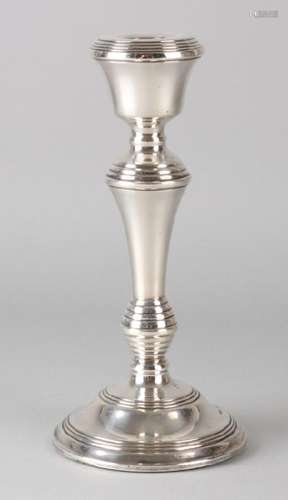 Silver candlestick, 925/000, on round filled base with